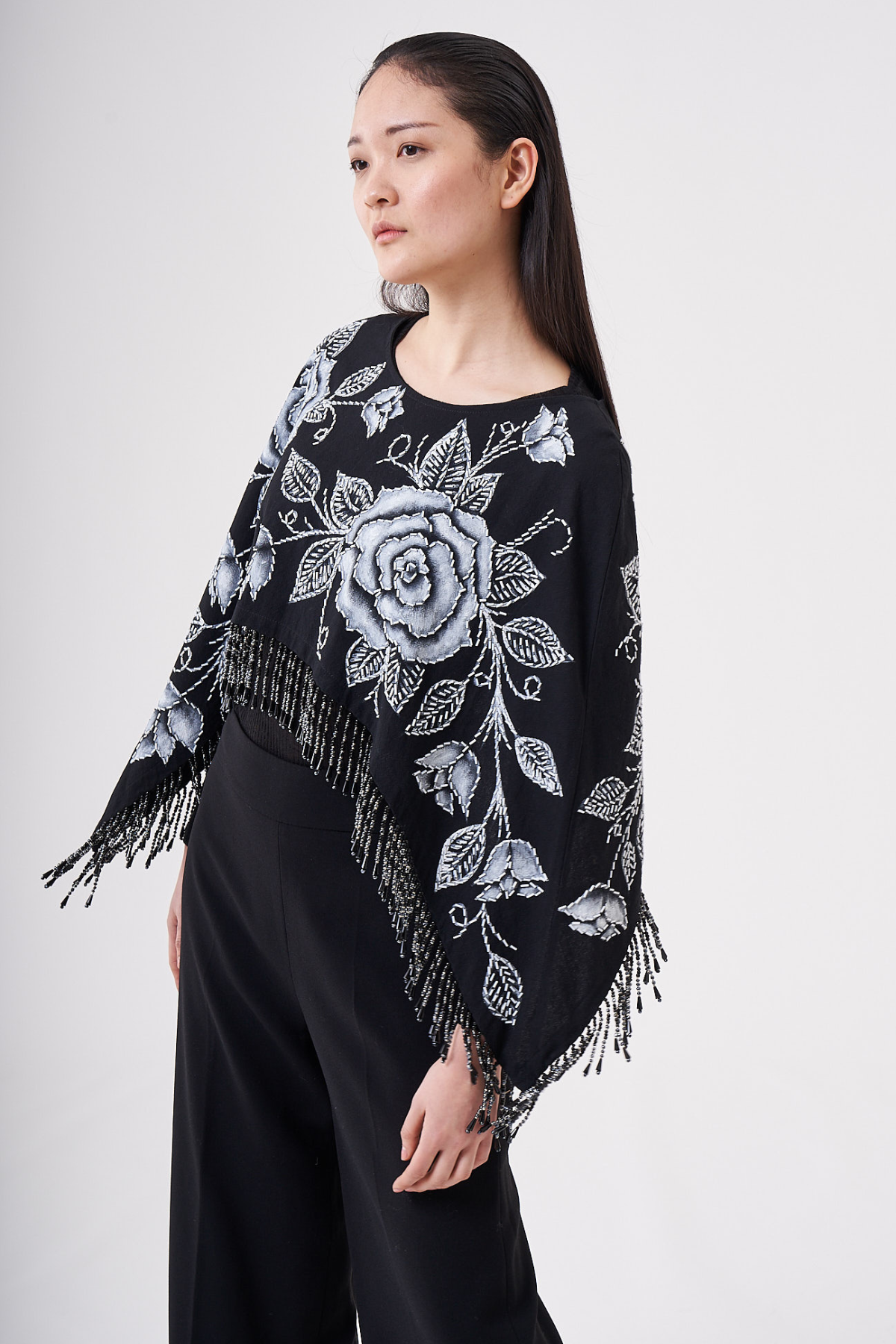 SHORT HAND-PAINTED AND HAND-EMBROIDERED CAPE WITH BEADED FRINGE