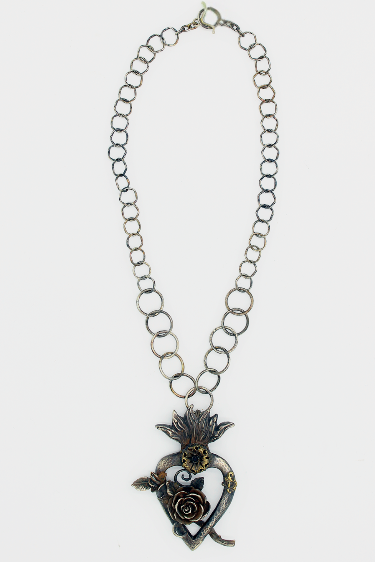 COLLANA SAGRADO CORAZON CON FIORE E CRISTALLO SFACCETTATO