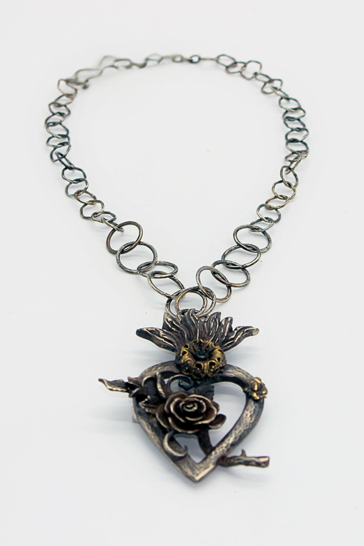 COLLANA SAGRADO CORAZON CON FIORE E CRISTALLO SFACCETTATO