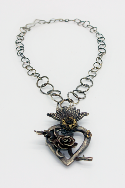 CORAZON SAGRADO NECKLACE WITH FLOWER AND FACETED CRYSTAL