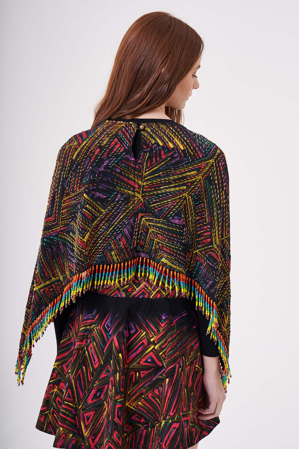 SHORT HAND-PAINTED AND HAND-EMBROIDERED CAPE WITH BEADED FRINGE