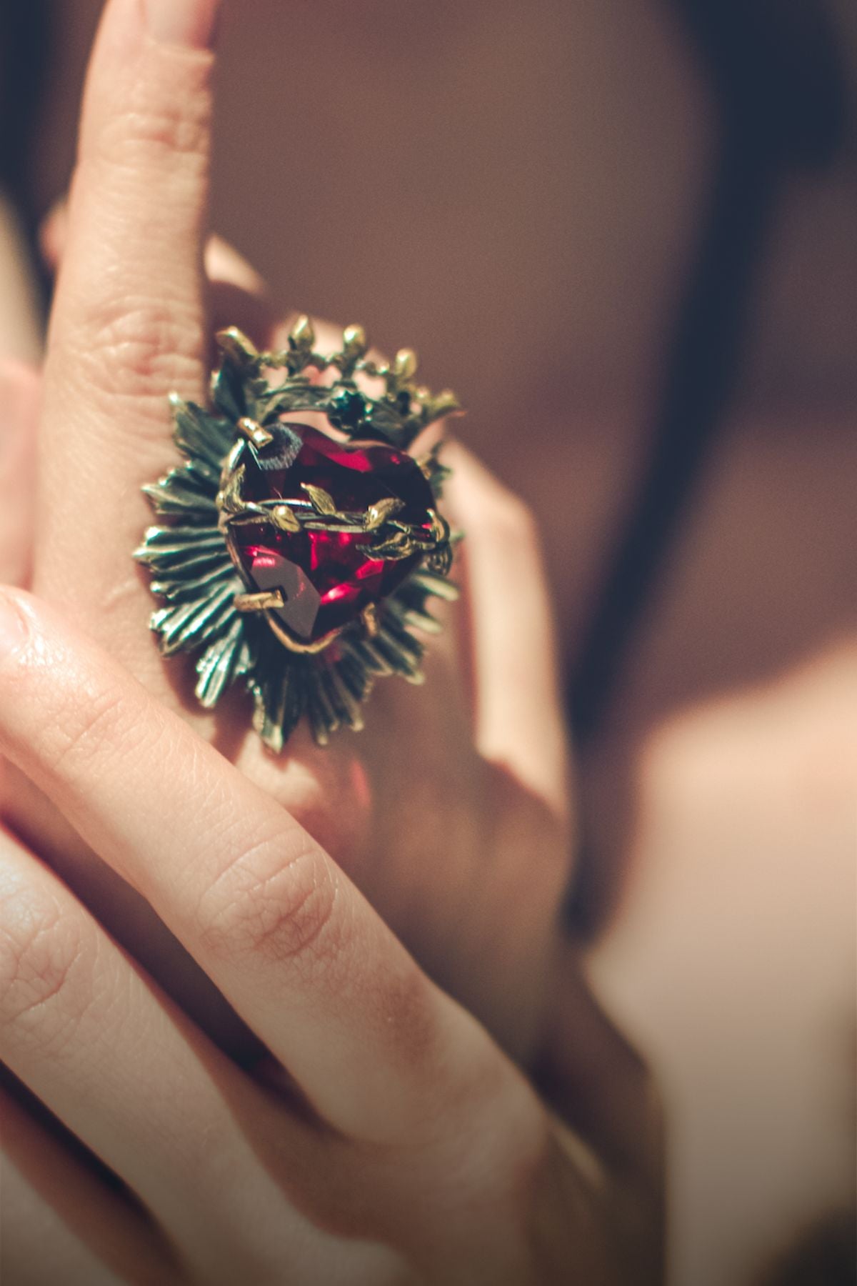 SAGRADO CORAZON CROWN RING WITH RED HAND FACETED HEART AND AMBER CRYSTAL