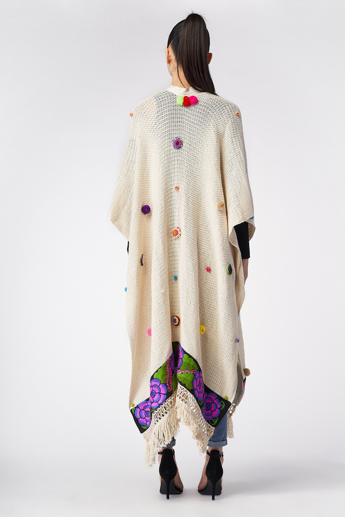 PONCHO CON BORDI IN JACQUARD FLOREALI - TEXTIL FLORES