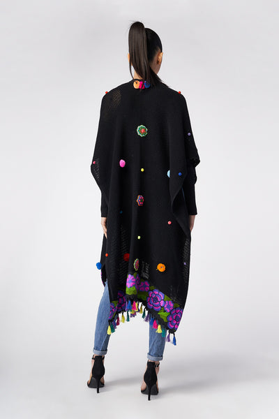 PONCHO CON BORDI IN JACQUARD FLOREALI - TEXTIL FLORES