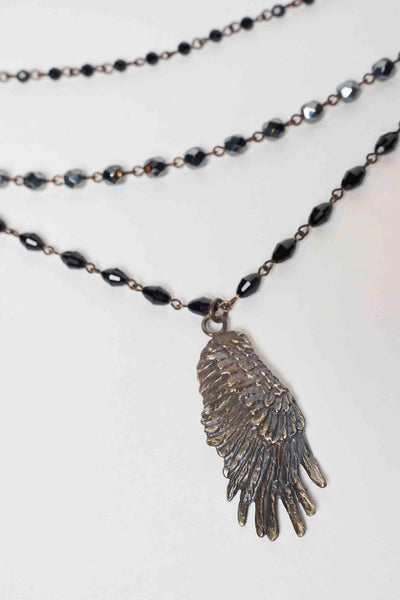 SILVER WING NECKLACE WITH FACETED BEADS