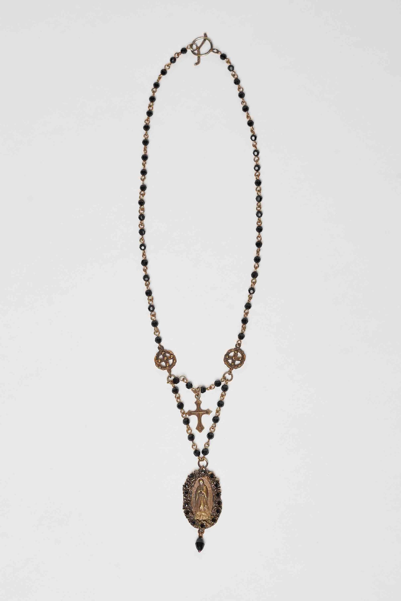 VIRGEN DE GUADALUPE NECKLACE WITH DECORATIVE PENDANTS AND CRYSTALS