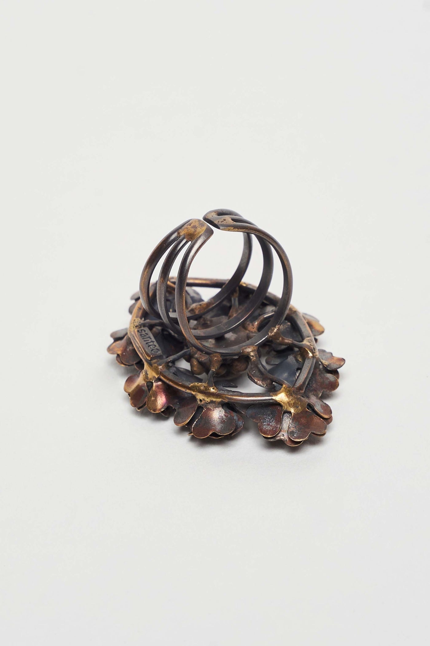 FLORES RING WITH BRONZE FLOWERS AND FACETED CRYSTALS